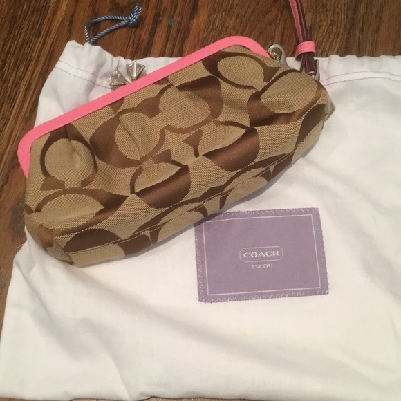 Coach Handbags - Tan and brown Coach clutch